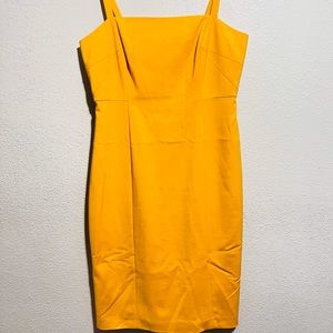 A vibrant yellow tailored dress by Antonio Melani